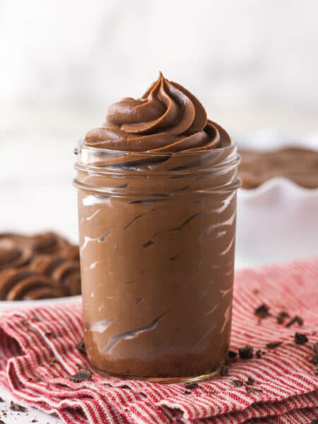 A glass jar of chocolate pastry cream
