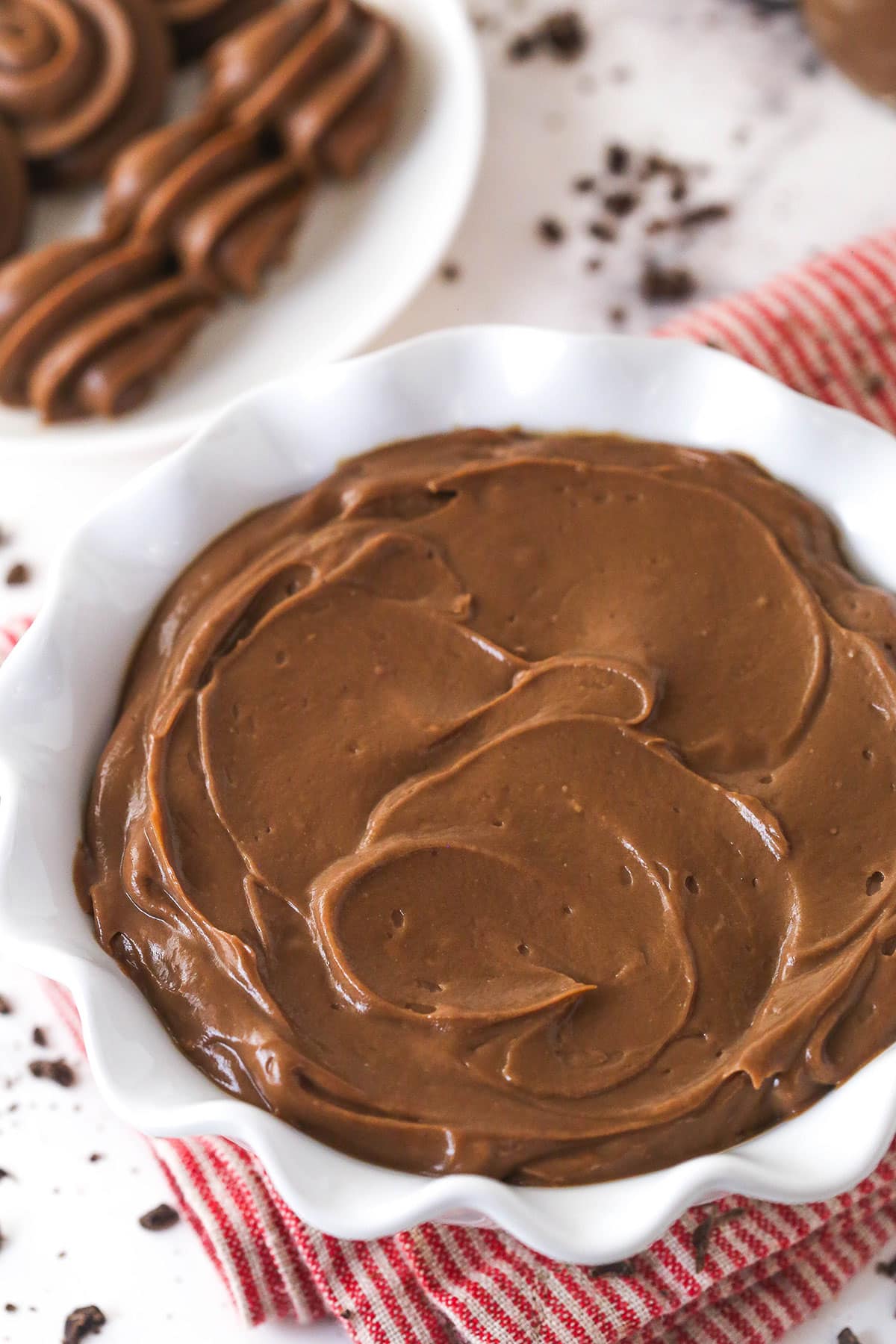 Thick, smooth, and creamy, this chocolate pastry cream (aka chocolate crème pâtissière) can be used in cakes, pastries, and other desserts. Chocolate pastry cream in a white bowl