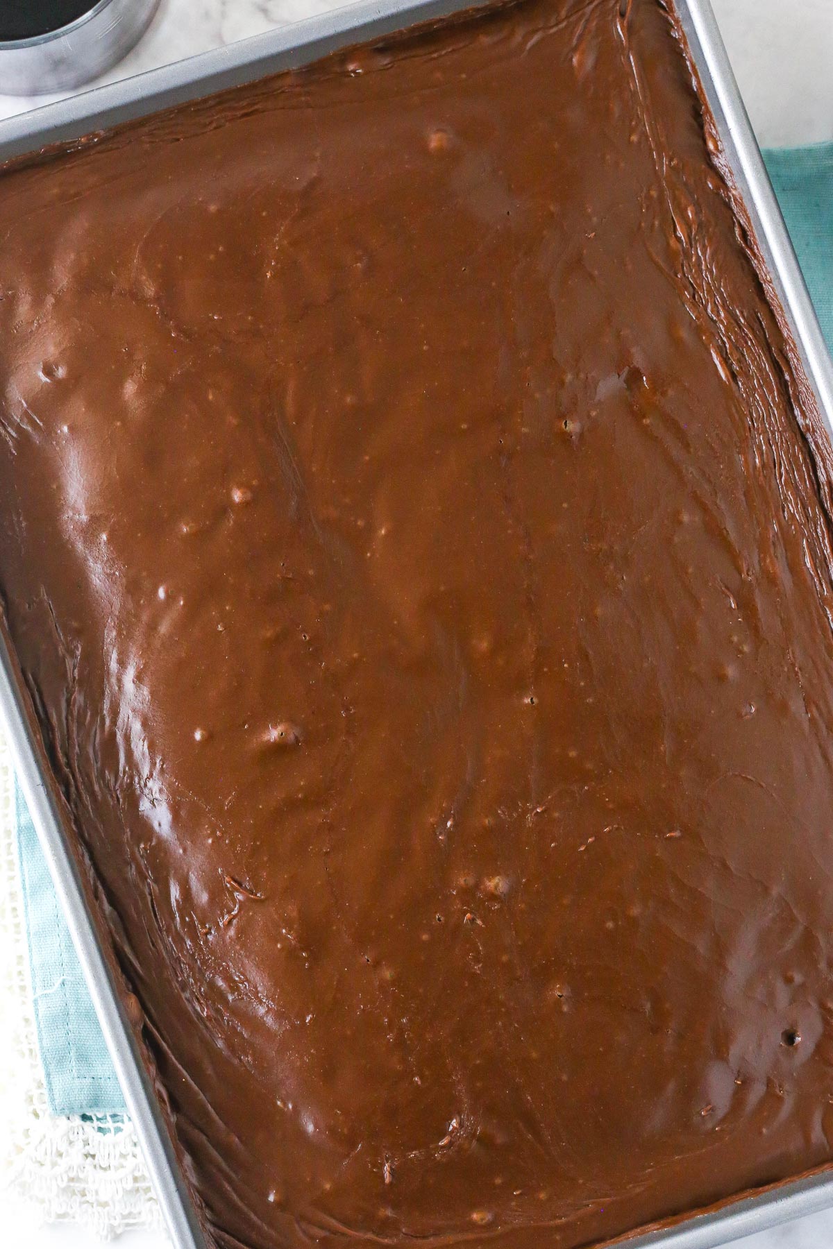 Top view of a Coca Cola cake in it's baking pan.