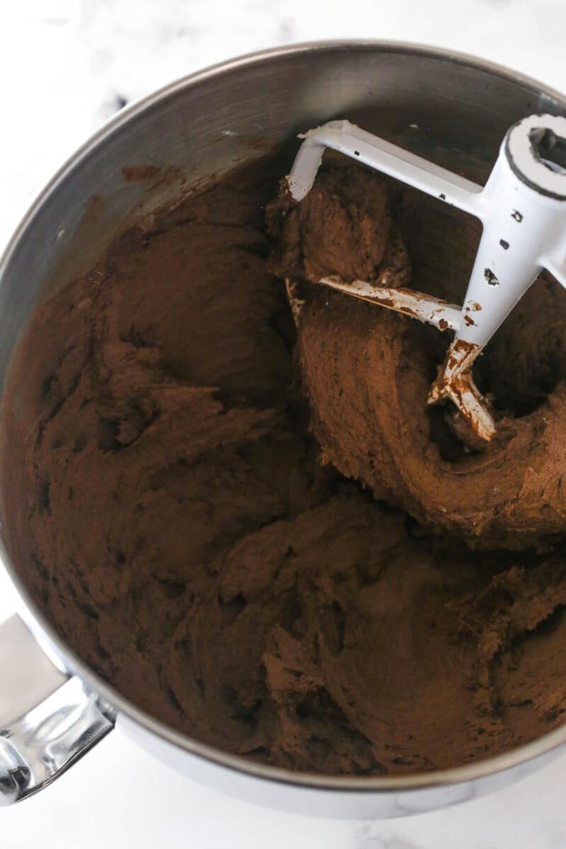 cookie dough in mixing bowl after adding dry ingredients