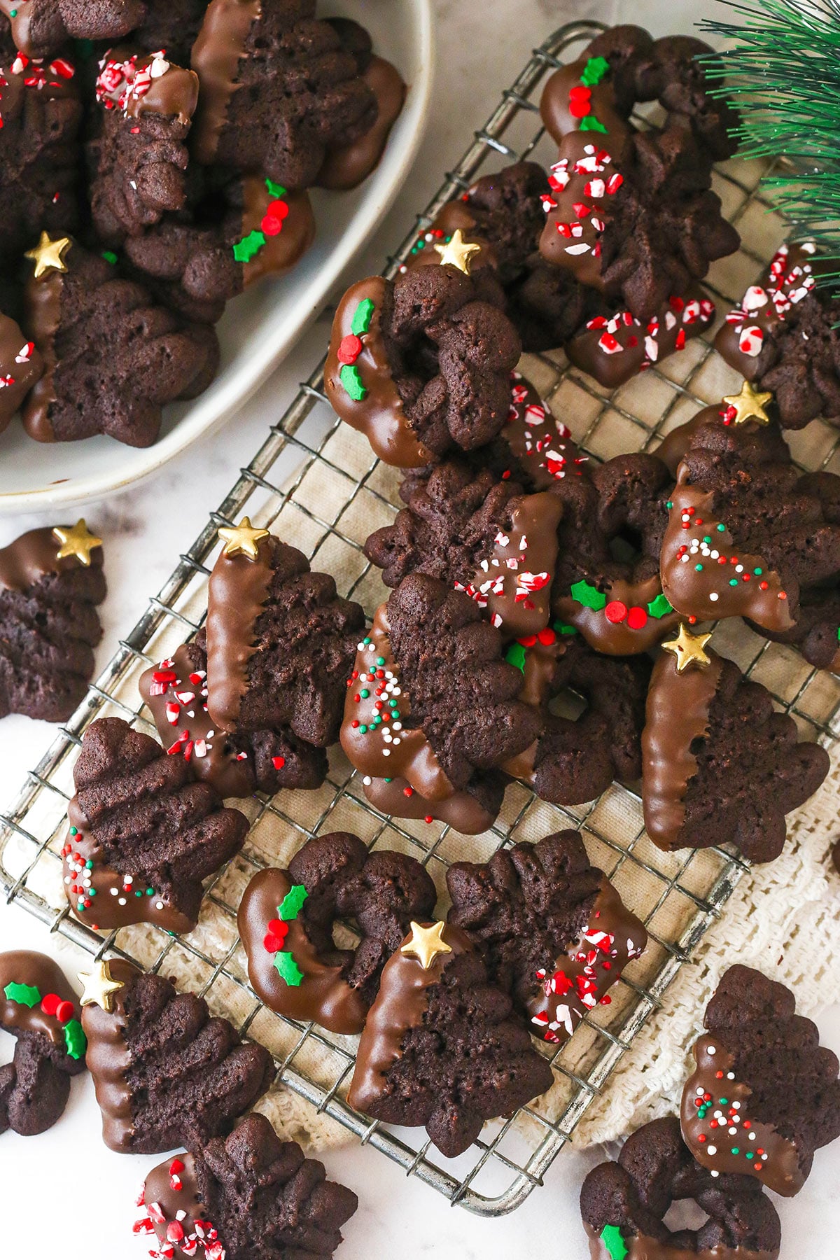 christmas chocolate spritz cookies on cooling rack