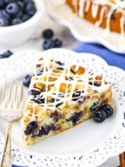close up of slice of Blueberry Streusel Coffee Cake on white plate