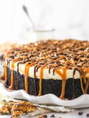 Samoa cheesecake on a serving platter.